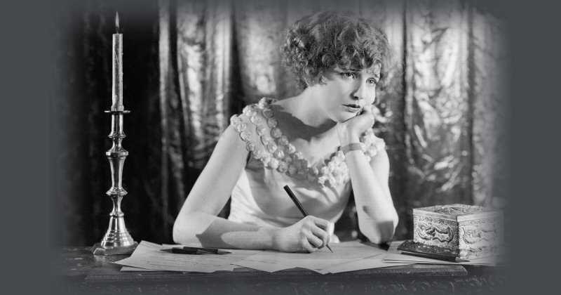 Woman Writing a Sad Letter